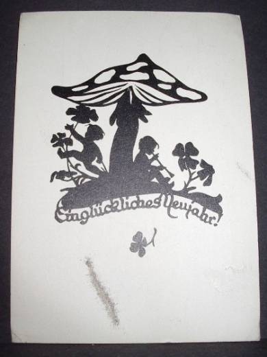 Papercut greeting card New Year, mushroom, clover, ca. 1950